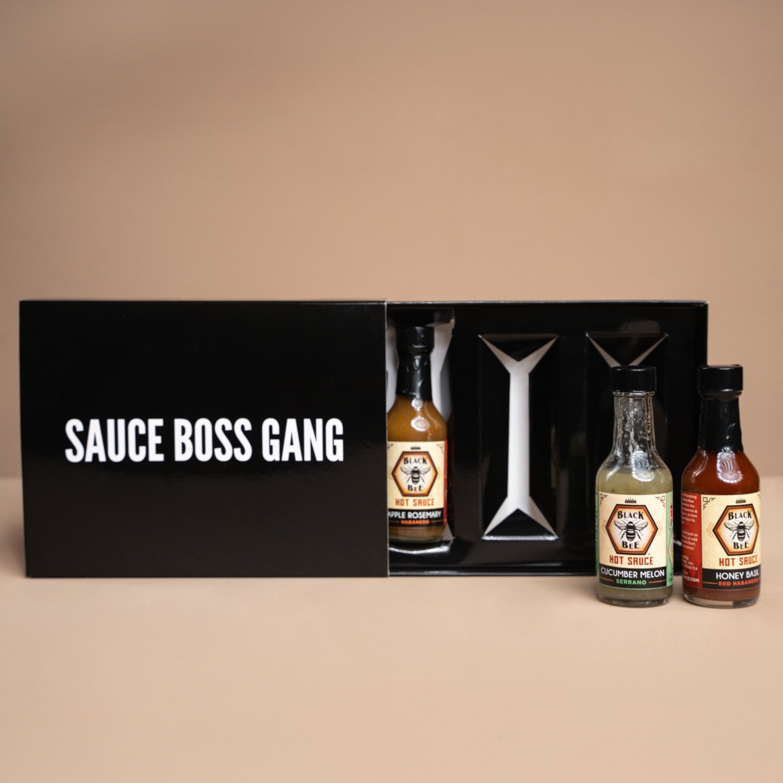 Sleeve-style custom packaging box with inserts for small bottles