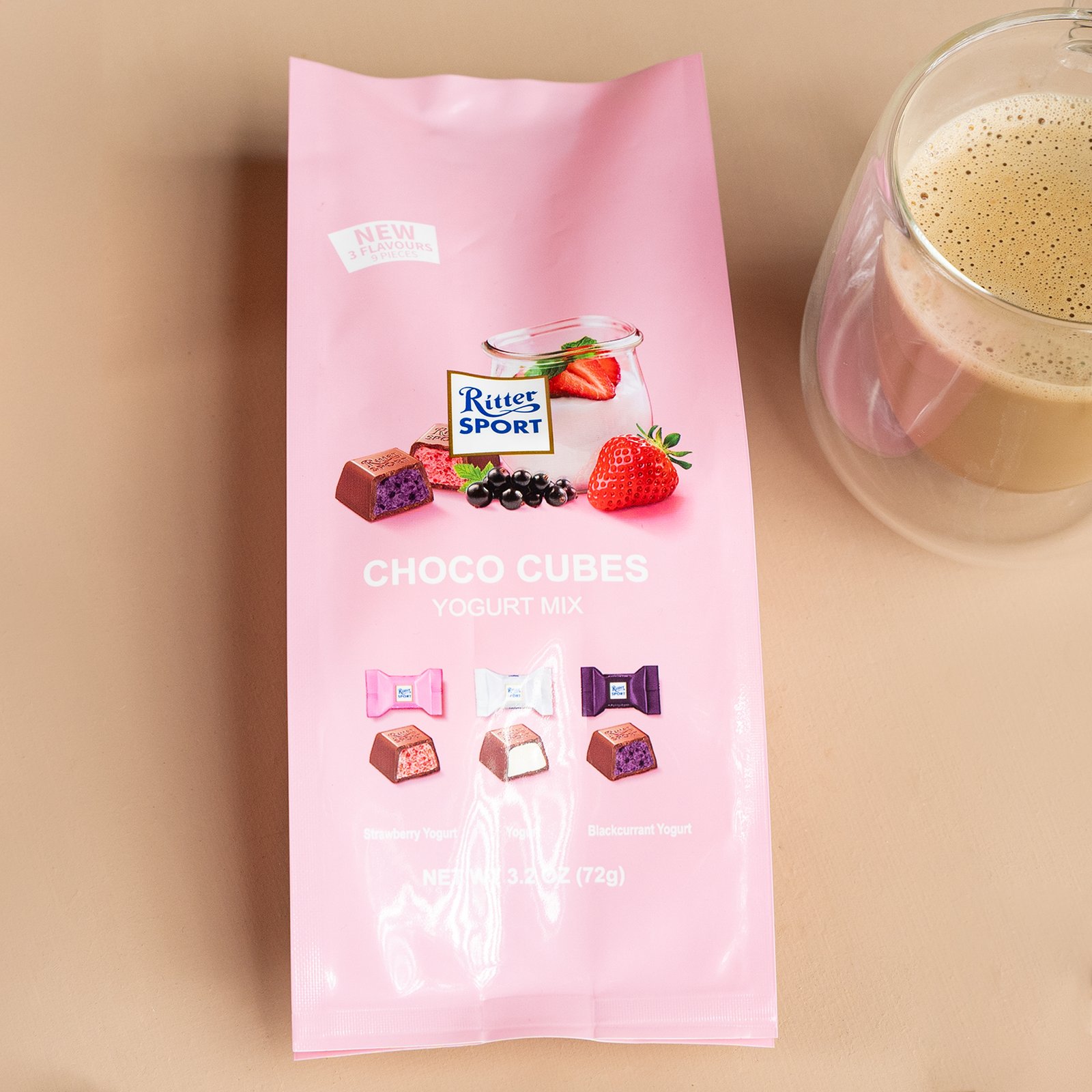 custom mylar bag packaging featuring branding artwork in different colors displayed on a beige background